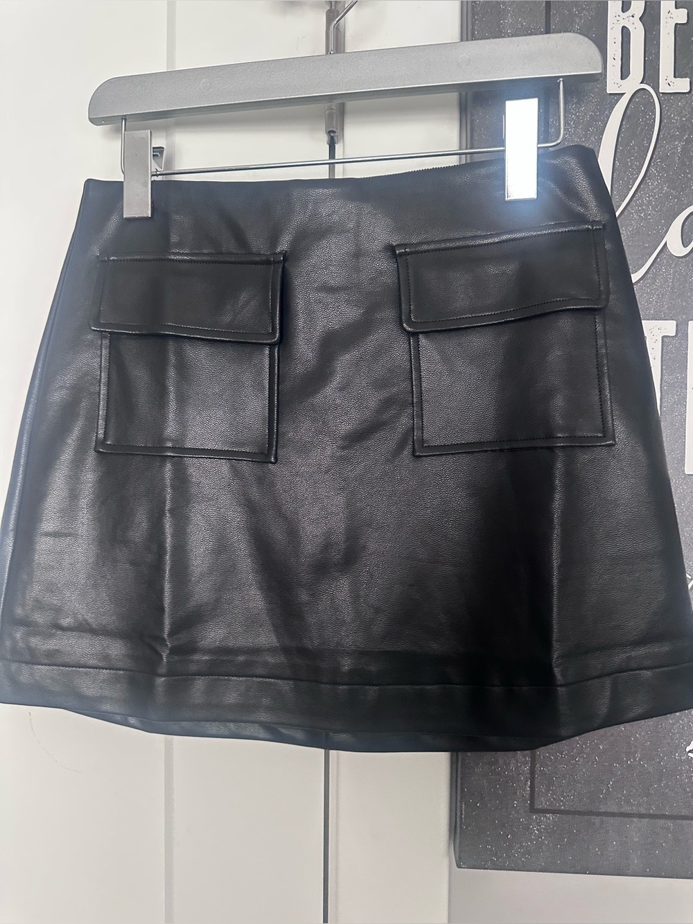 NWOT(comes tagless) new Black Faux Leather Mini Skirt with Front Flap Pockets